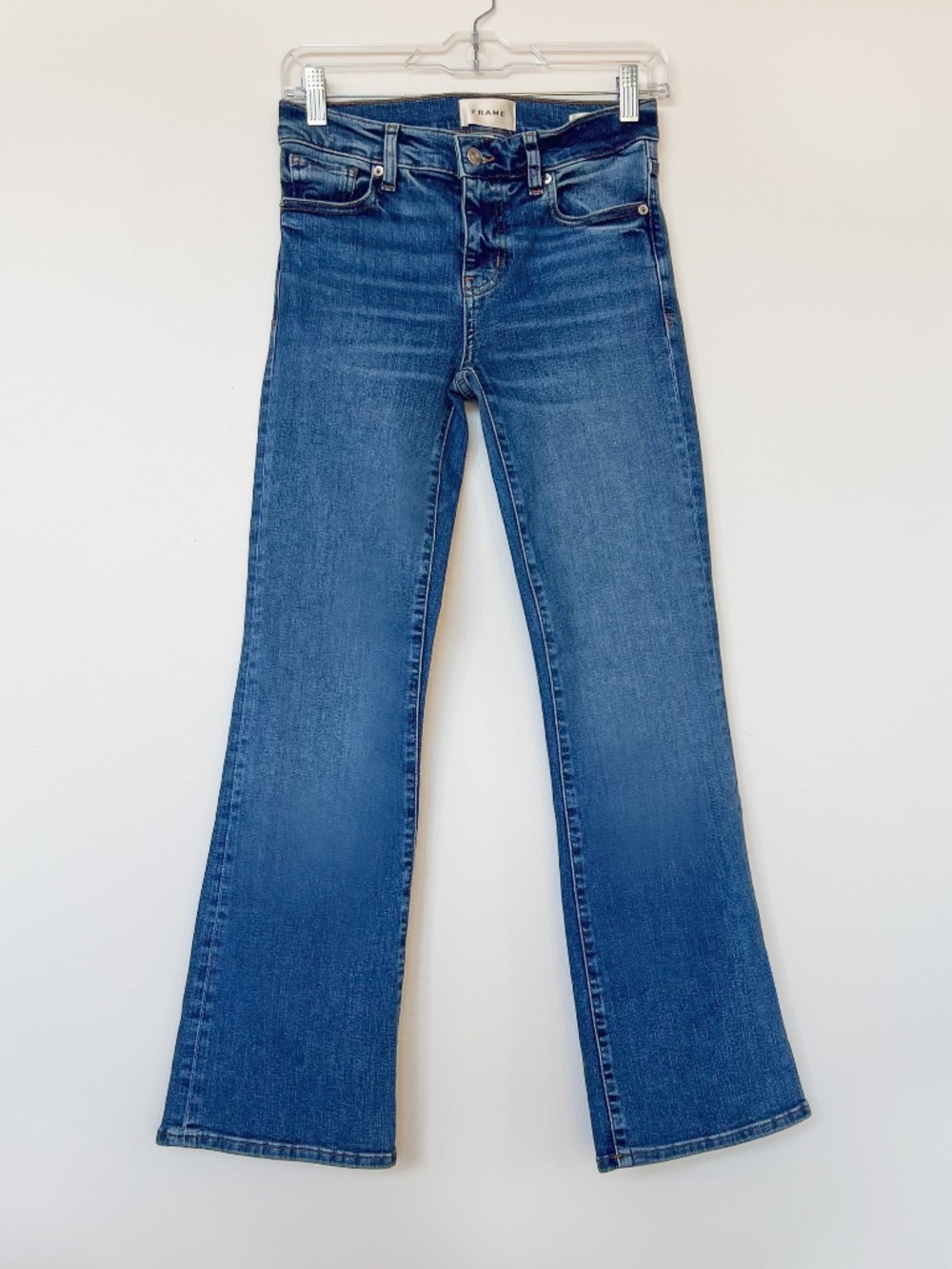 FRAME Denim: The Pixie Rodeo Low-Rise Bootcut Jeans in Daylily. Size 25.